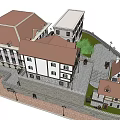 Traditional European Architecture Featuring Red Brown Roofs White Walls Courtyard Stone Paths and Trees