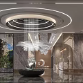 Elegant Modern Hotel Lobby With Round Chandelier Marble Walls Water Feature Glass Wall And Greenery
