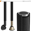 Black Headphones And Cylindrical Speaker With Silver Edge And Small Dots On Top