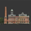 Historic Red Brick Building With Tall Chimney Green Roof Arched Windows And Surrounding Trees