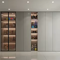 Elegant Walk in Closet with White Cabinets Glass Doors Gold Handles and Built in Shelves