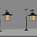 Vintage Style Outdoor Lights with Curved Poles Decorative Lamp Shades Illuminated Against Brick Wall