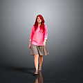 Red Haired Woman Wearing Pink Top And Gray Skirt Walking Against Gray Background