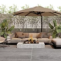 Comfortable Outdoor Sofa with Fire Pit Umbrella and Plants near Wooden Fence on Concrete Floor