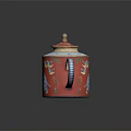 Traditional Red Teapot with Blue Elephant Bird Patterns and Decorative Woven Lid