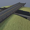 Urban Asphalt Road With Yellow Lines Under Bridge And Concrete Wall Along Green Grass