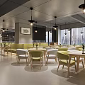 Modern Restaurant Interior With Green Seats Wooden Tables And Pendant Lights