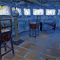 Ship Wheelhouse Interior With Wooden Chairs Tables Control Panels And Orange Floor