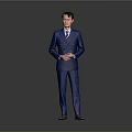 A Man In Well Fitted Blue Pinstripe Suit With Clasped Hands Standing On Gray Background
