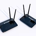 Two Modern Black D-Link Wireless Routers With Multiple High Gain Antennas 3d model