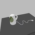 Essential White Electric Kettle Kitchen Appliance With Power Cord On Black Tabletop