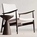 Modern Accent Chair With White Cushion Dark Wooden Frame And Small Side Table