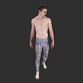 Shirtless Male Model Wearing Patterned Leggings Standing Full Length On Black Background
