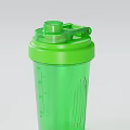Green Sports Water Bottle with Straw and Flip Lid on Light Blue Background