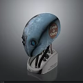 Blue Biomechanical Creature Head With Fetch & Carry Text Intricate Patterns And Silver Base