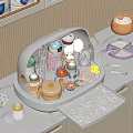 Household Items Including Jars Bottles and Spoons in White Storage Organizer on Kitchen Countertop