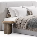 Beige Double Bed With Upholstered Headboard White Pillows Striped Blanket And Wooden Side Table