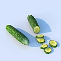 Fresh Whole Cucumbers and Sliced Pieces Placed on Wooden Cutting Board