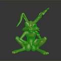 Golden Rabbit Sculpture With Shiny Metallic Finish And Unique Sitting Pose