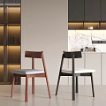 Modern Black Dining Chairs With White Cushions In Kitchen Dining Area