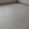 Light Gray Floor Tiles In Modern Interior With Smooth Surface And Clean Joints
