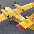 Yellow Airclinic Airplane With Twin Propellers Number 245 On Ground