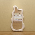 Light Colored Irregular Wavy Frame Mirror Hung On Beige Wall Reflecting Room Interior