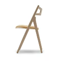 Modern Wooden Leisure Chair With Light Colored Upholstered Seat And Hollow Backrest