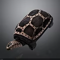 Hand Carved Turtle Sculpture With Purple Pink Geometric Patterns And Dotted Decoration