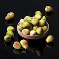 Fresh Ripe Pears in Wooden Bowl with Scattered Ones on Black Background