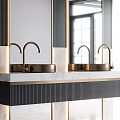 Elegant Bathroom Vanity With Double Gold Sinks Arched Mirrors And Marble Countertop