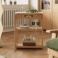 Wooden Coffee Table With Shelves Green Fruits Books Clock And Basket Of Bottles