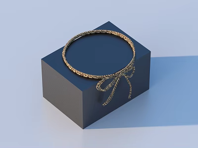 Elegant Gold Braided Bracelet With Bow Decoration On Black Cube Stand For Daily Use 3d model