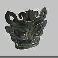 Ancient Bronze Mask With Large Eyes And Intricate Mythical Carvings