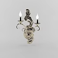 Ornate Silver Wall Sconce With Two Candle Shaped Lights And Scroll Design