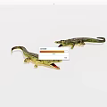 Two Green Plastic Crocodile Toys With Open Mouths On White Background