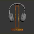 Gray Over Ear Headphones On Red Rusted Metal Stand With Stable Base