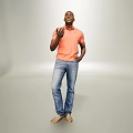 Man Standing In Orange Polo Shirt Blue Jeans Tan Shoes Against Light Gray Background