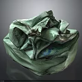 Pile Of Crumpled Green Woven Sacks With Textured Fabric And Used Appearance
