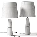 Two Stylish Table Lamps Featuring Textured Wooden And Marble Bases With Fabric Shades