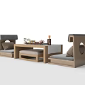 Modern Tea Table and Gray Cushioned Chairs Set with Wooden Frame and Simple Design