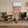 Modern Leisure Chairs With Wooden Frame In Indoor Space With Decorative Painting And Orange Plant