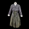 Traditional Korean Hanbok Featuring Purple Geometric Pattern Jeogori And Green Chima With White Trim