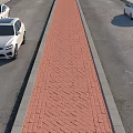 Urban Road Infrastructure With Two-Way Lanes Red Brick Pavement And Parked Cars