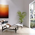 Modern Chaise Lounge In Bright Indoor Room With Orange Painting Potted Plant And Garden View