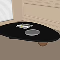 Modern Black Oval Coffee Table with Metal and Wooden Legs and Silver Tray plus Magazine