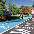 Tree Lined Greenway Road Facilities With Bicycle Lane Walking Path Start Sign And Arrow Indicators