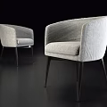 Gray Fabric Armchair With Brown Blanket Draped Over Armrest And Wooden Legs