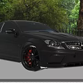 Black Mercedes Benz Sports Car With Red Rims And Sporty Front Face Design