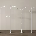 White Outdoor Lights with Five Different Designs Standing on Wooden Floor and Light Colored Background